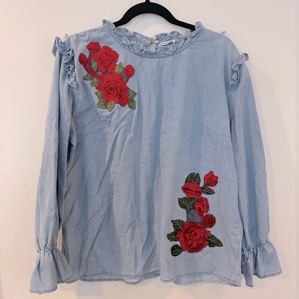 Women’s long sleeve denim blouse with red flower print. Size is 2XL